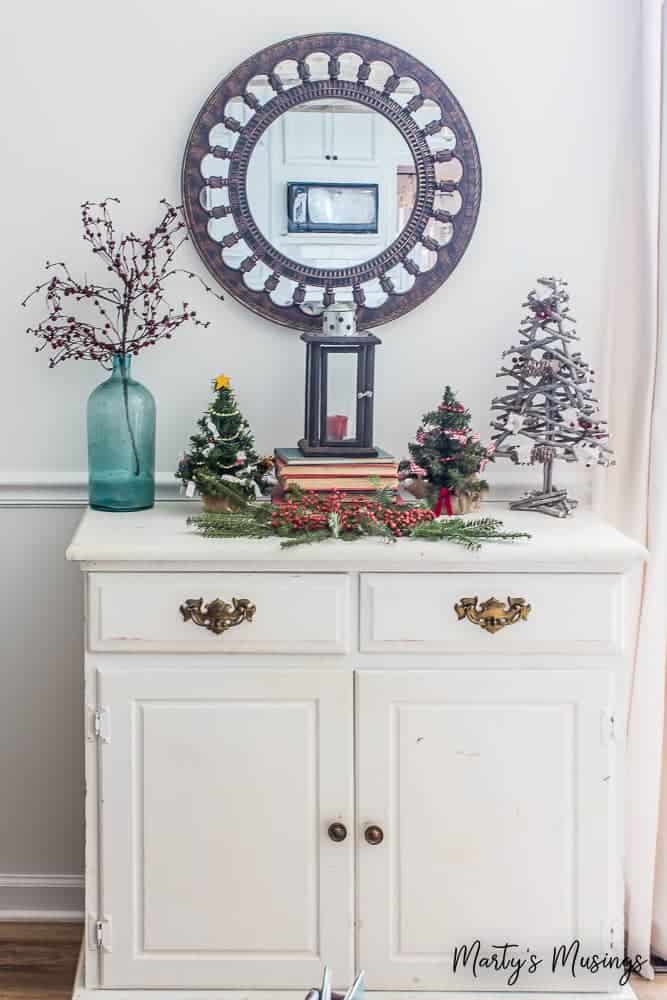Filled with thrifty aqua and red decor and easy DIY tips, this 2017 Christmas home tour also gives encouragement for embracing the heart of the home.