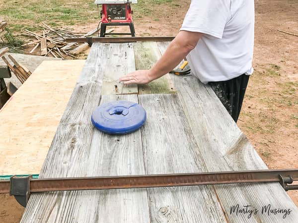 A man sitting at a picnic table