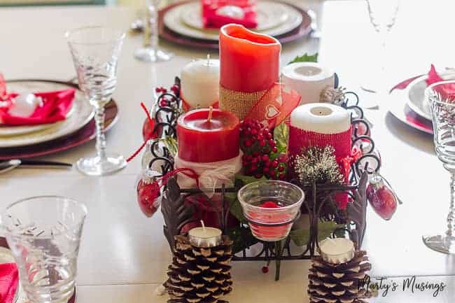 A table topped with plates of food, with Valentine's Day and decoration