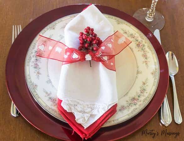 A piece of cake on a plate, with Home and Valentine's Day