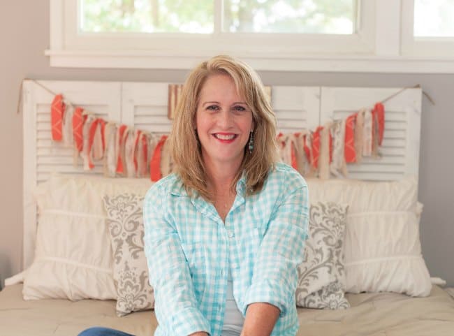 A person sitting on a bed