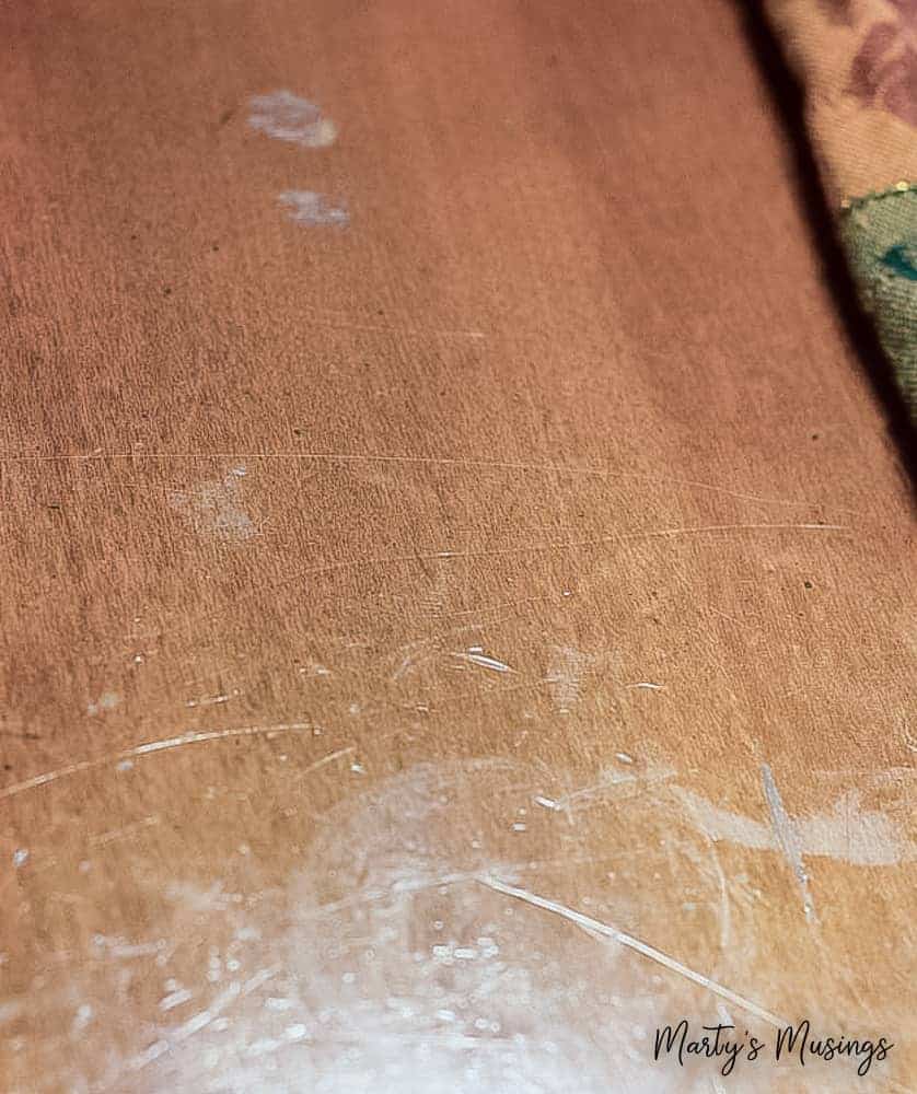 old farmhouse table with scratches