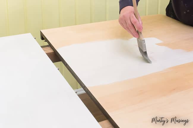 first coat of paint on farmhouse kitchen table