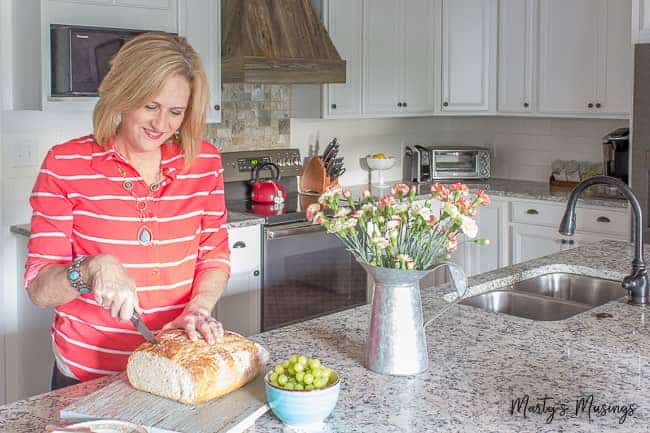 Marty Walden in her newly remodeled ranch home style kitchen