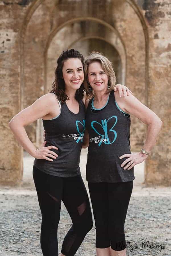 Mom and daughter in workout clothes
