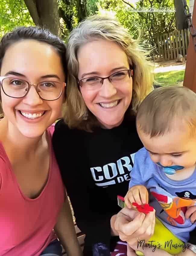 Mom with daughter and grandson enjoying her many roles in life.