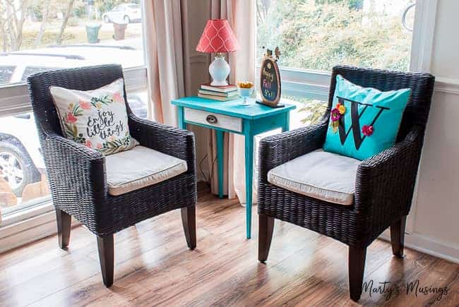 A dining room table in front of a window