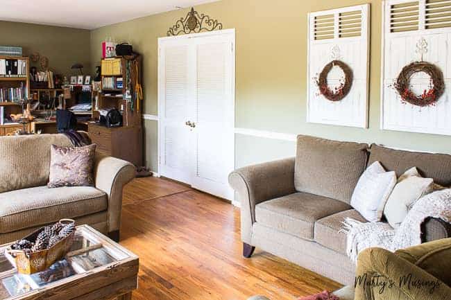 A living room filled with furniture and a fire place