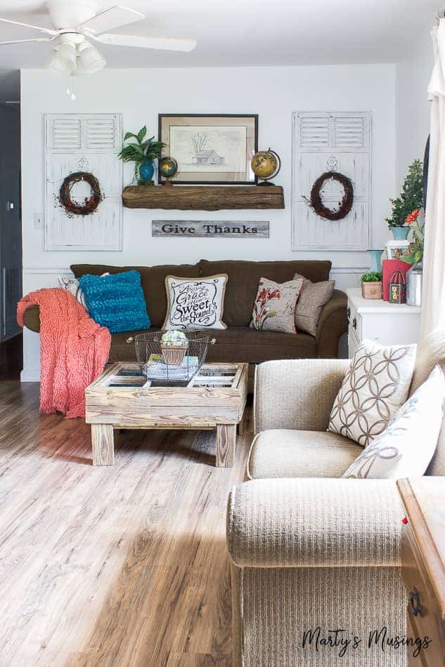 A living room filled with furniture and a fire place