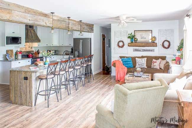 A living room filled with furniture and a fireplace