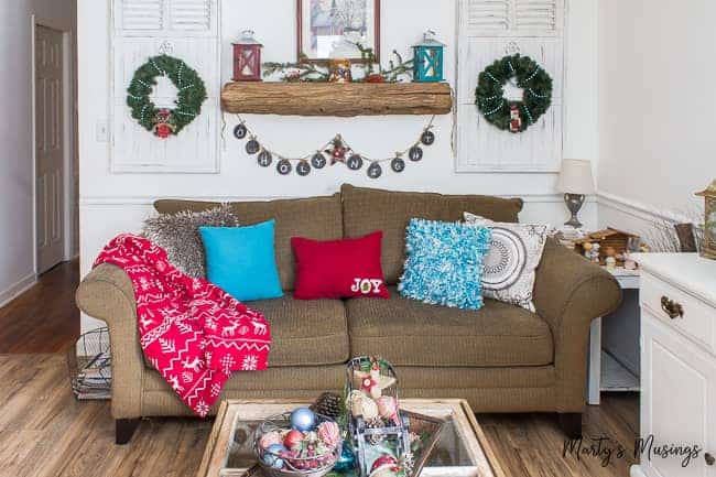 A living room filled with furniture and a fireplace