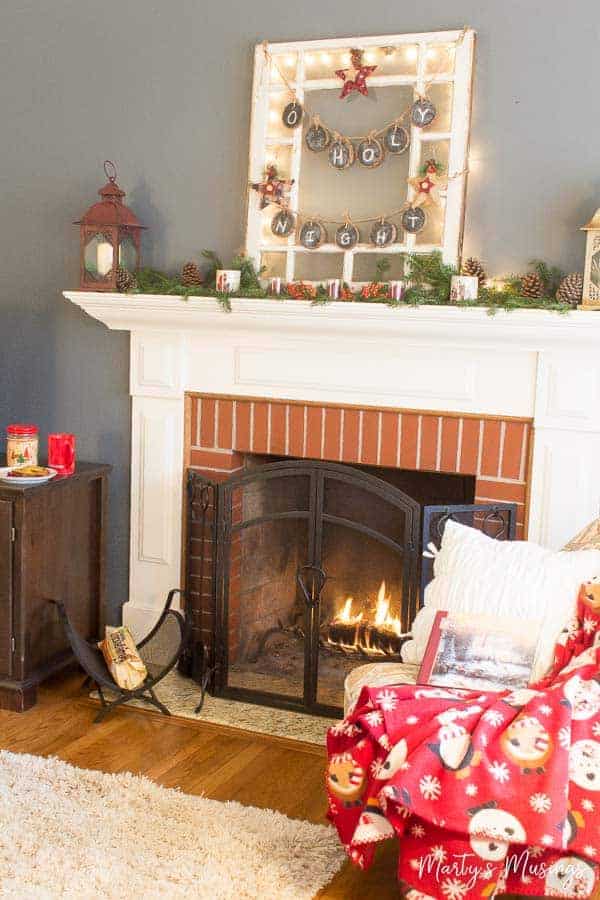 Decorating a Christmas mantel the cheap way with nature and repurposed accessories.