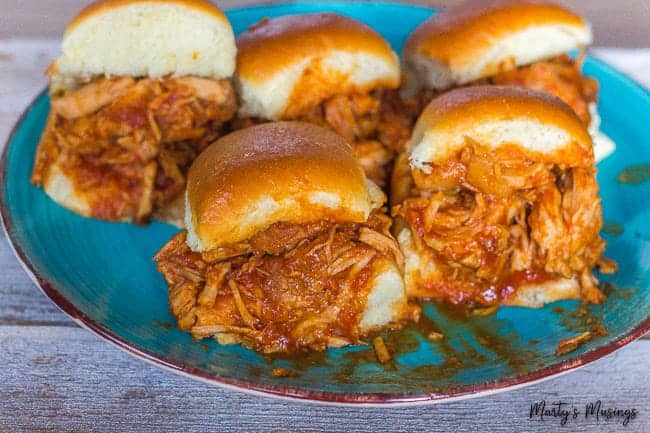 Pork sliders on blue plate