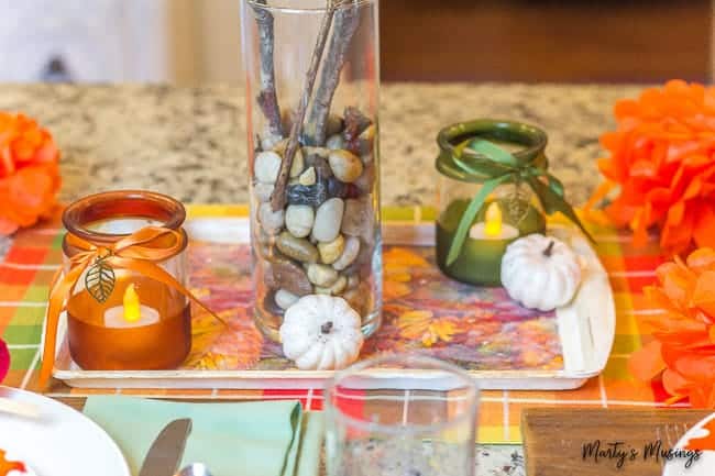 orange and green dollar store candles on fall table