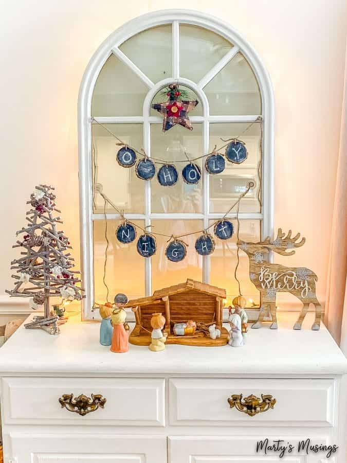 Chalk painted buffet with cathedral window and nativity scene