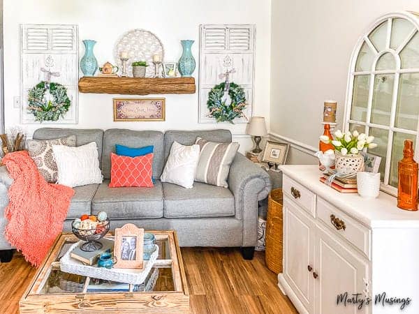 A living room filled with furniture and a fire place