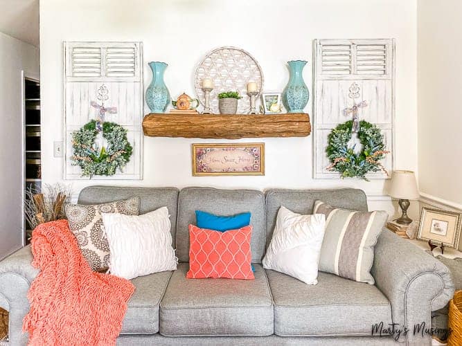 A living room filled with furniture and a fire place