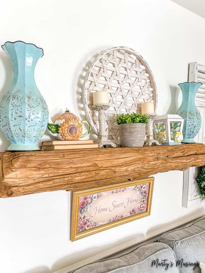 A vase sitting on top of a wooden table