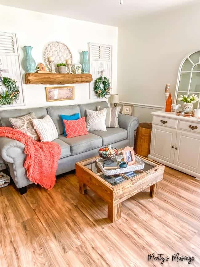 A living room with a wooden floor