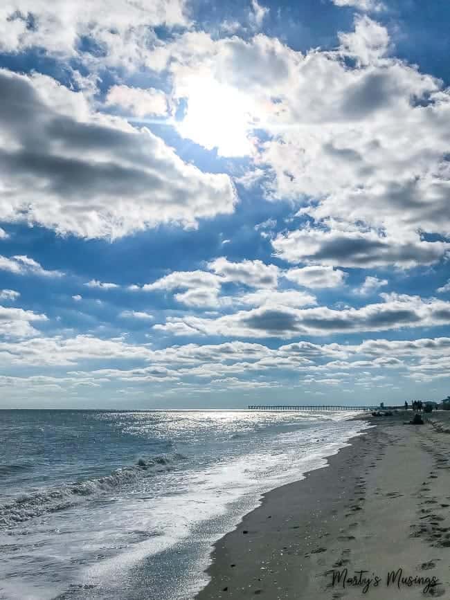 A view of a beach next to the ocean