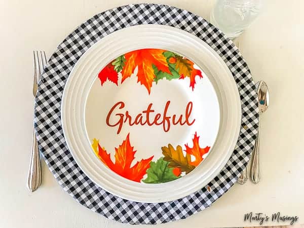 Black and white buffalo plaid charger with grateful plate