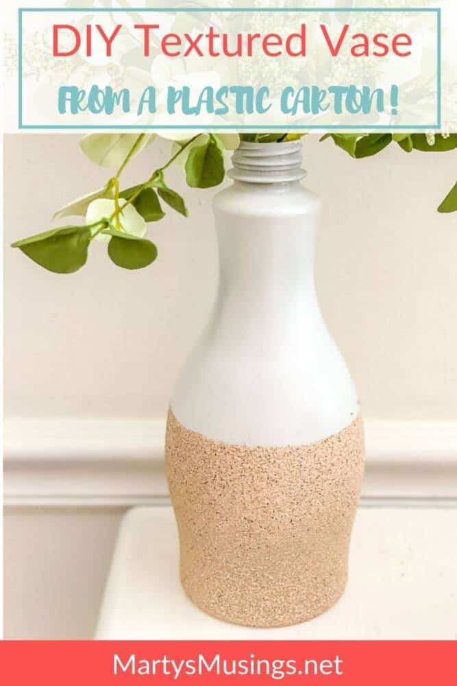 milk carton painted with textured rock spray paint for a vase