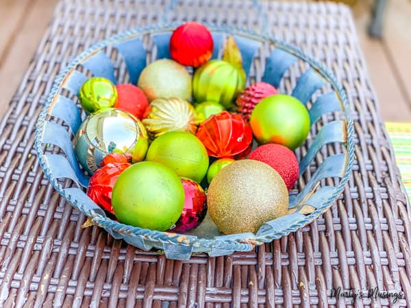 A bowl of fruit sitting on a table