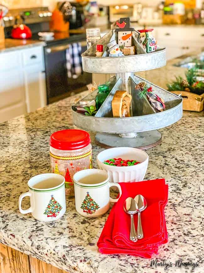 Metal tray with Christmas decorations and china