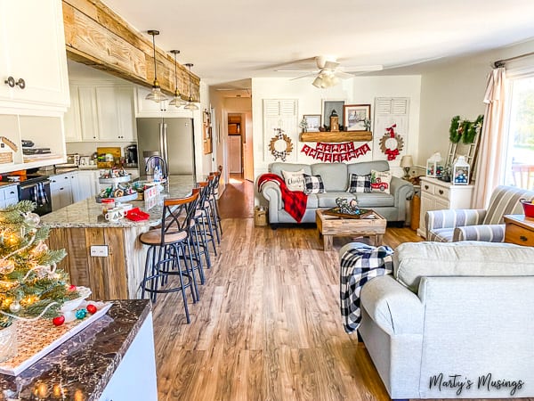 room filled with Christmas accents and ways to know how to decorate for Christmas on a budget