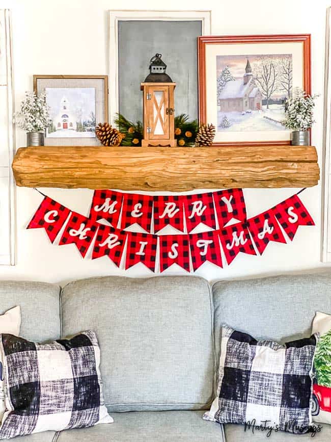 Buffalo plaid Merry Christmas banner with rustic mantel and decor