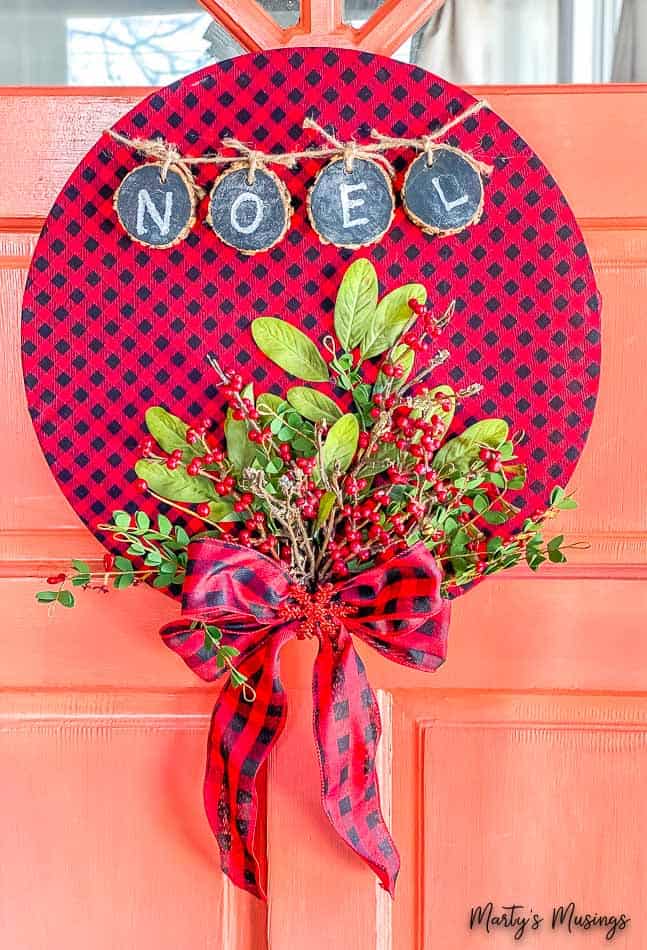 buffalo plaid hoop wreath with Christmas flowers