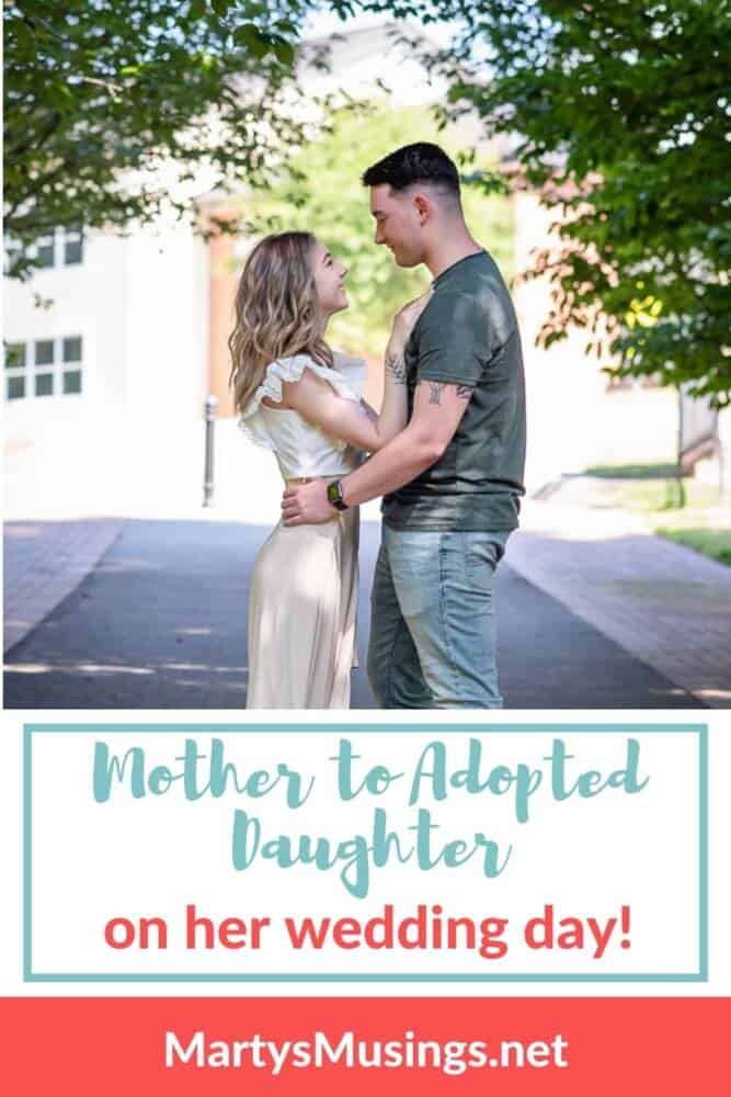 mother to adopted daughter on her wedding day pic with bride and groom