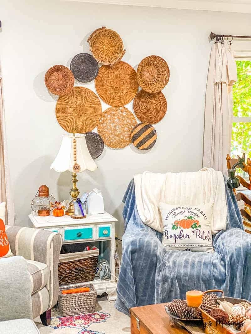 Basket wall and chairs decorated for fall