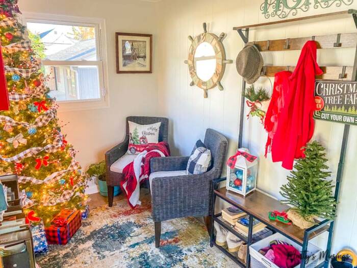 Sunroom with Christmas tree, drop zone and red and blue decorations