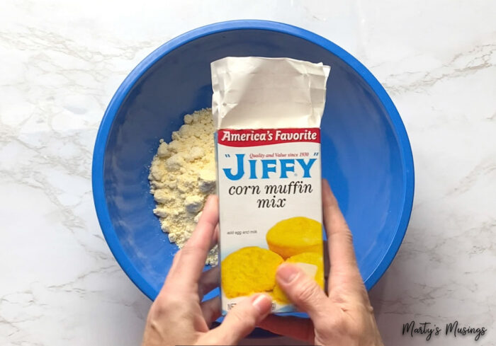 Jiffy corn muffin mix and blue bowl