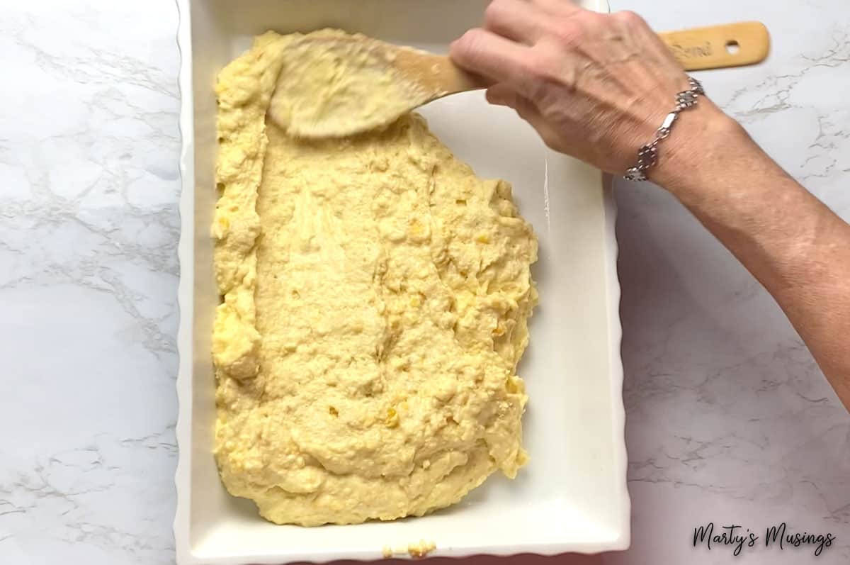 Corn bread mixture in white dish