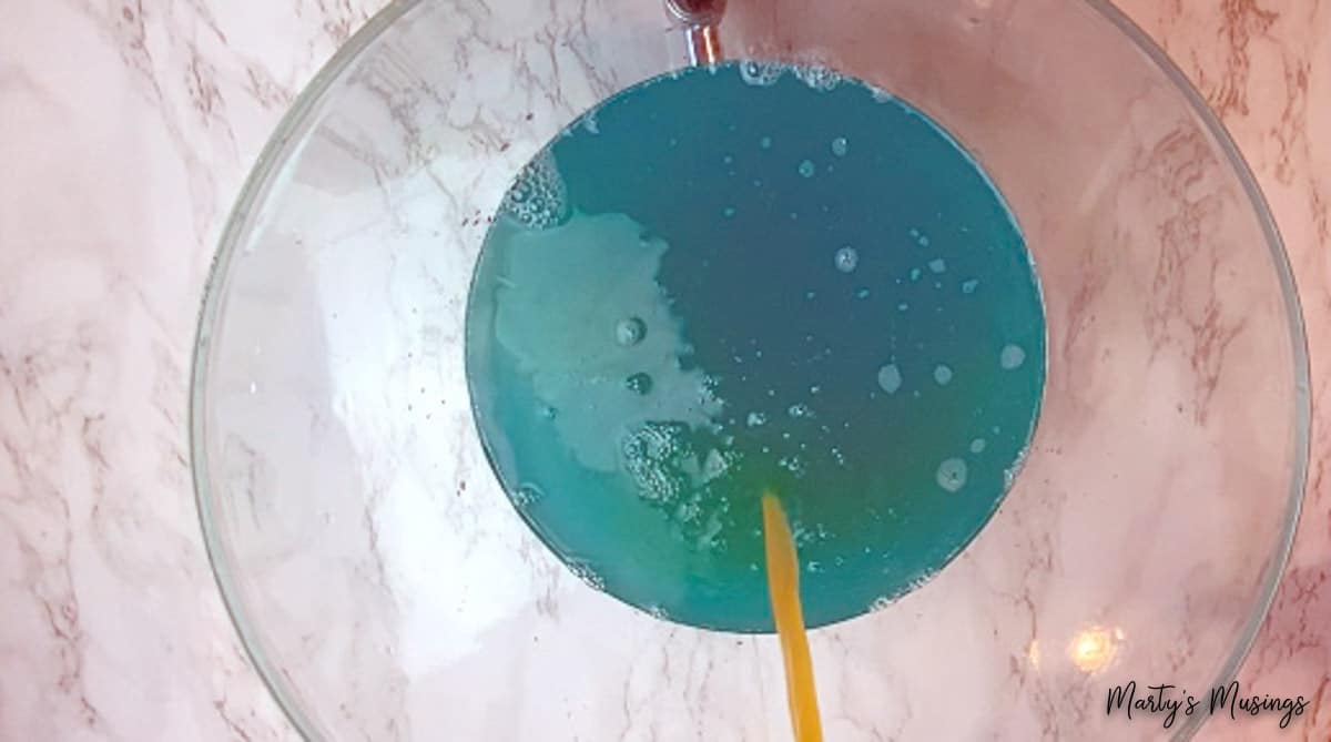 Pineapple juice added to blue party punch