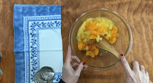 Mix pineapple and mandarin oranges together