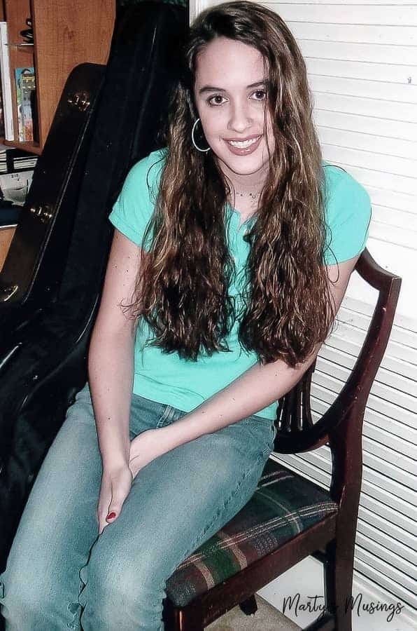 Teenaged girl with long curly hair