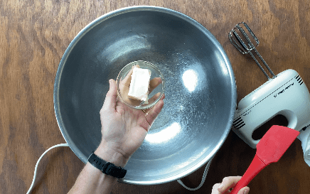 Add butter to metal bowl