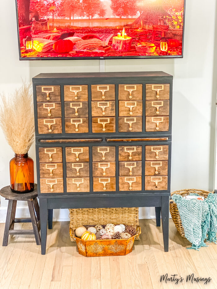 Painted card catalog with tv above