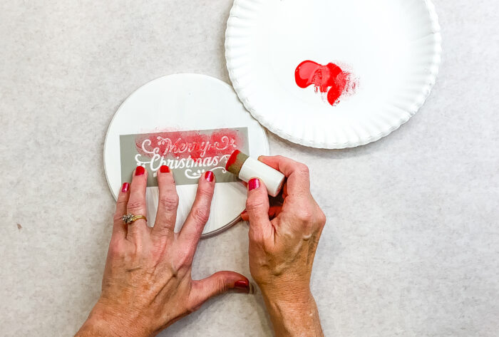 Stamping with red on white lid