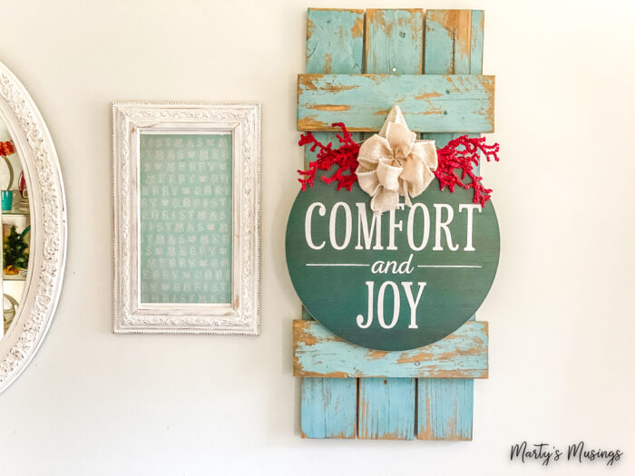 blue frame with comfort and joy sign