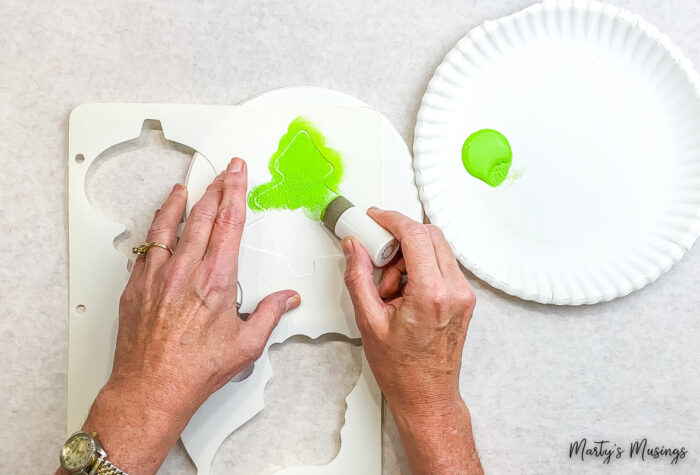 Stamping with green ink and white stencil