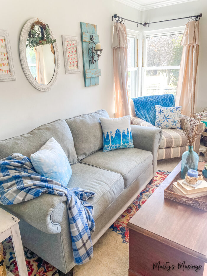 cozy living room with winter pillows and throws