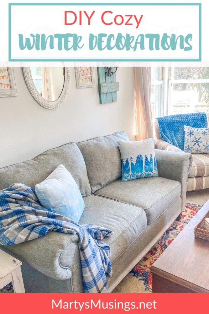 blue couch with winter pillows