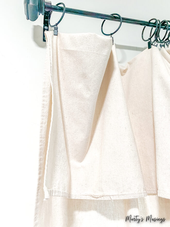 Curtains hanging from large rings