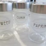 Clear jars with labels for spices