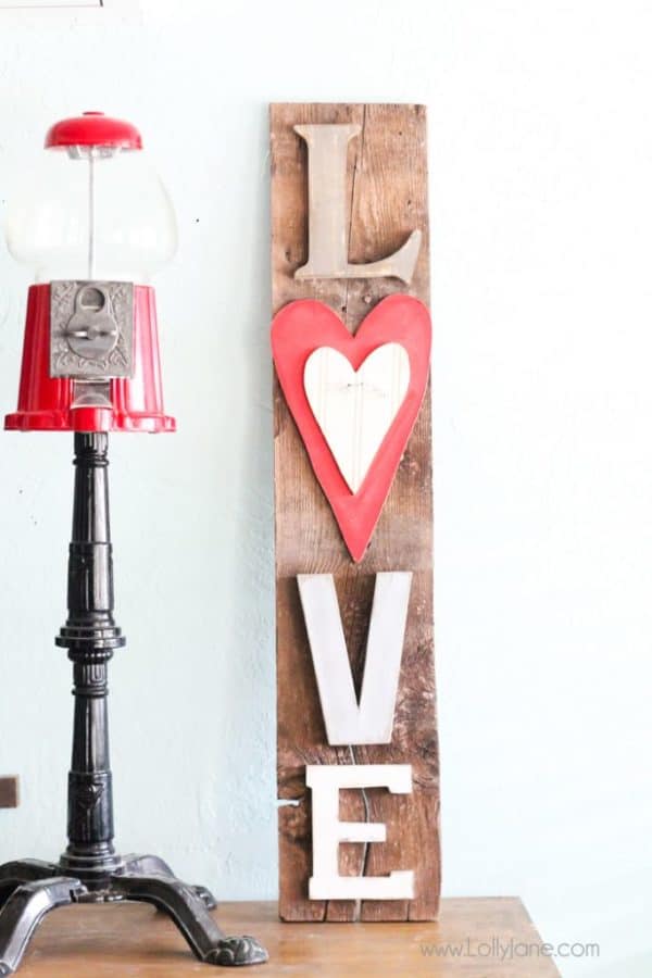 Rustic wood sign with love in wooden letters