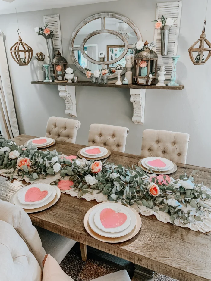 Rustic table with flowers and Valentine plates